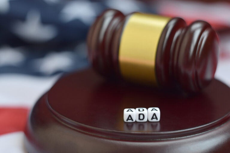 Judge's gavel beside blocks representing ADA accessible websites.