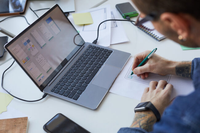 Web designer working to build a website Designer working to build a website