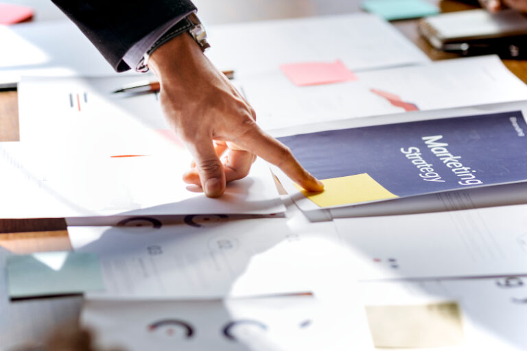 A hand pointing to a strategy to get found online.