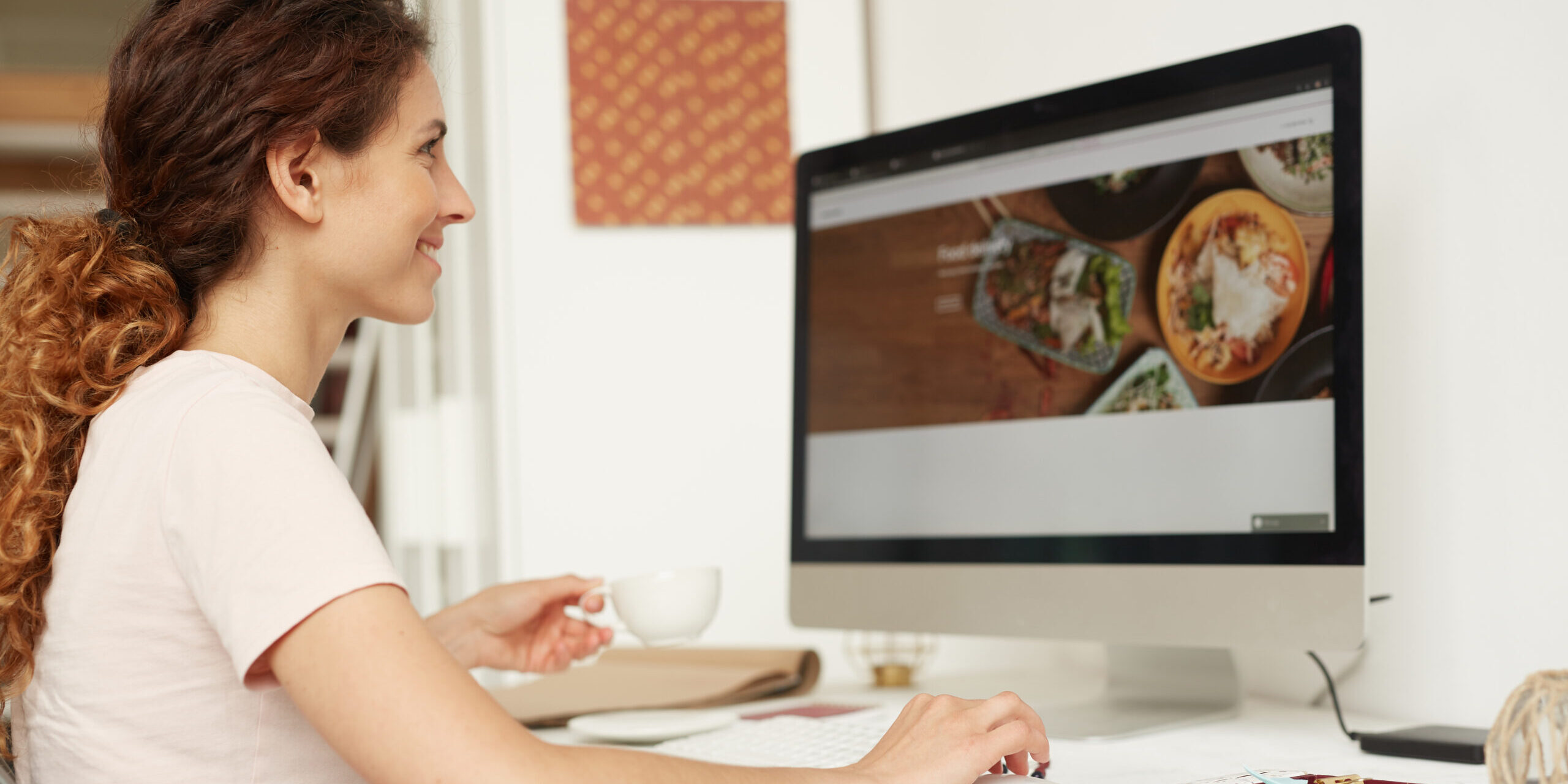 Web designer working on website. Web designer working on website.