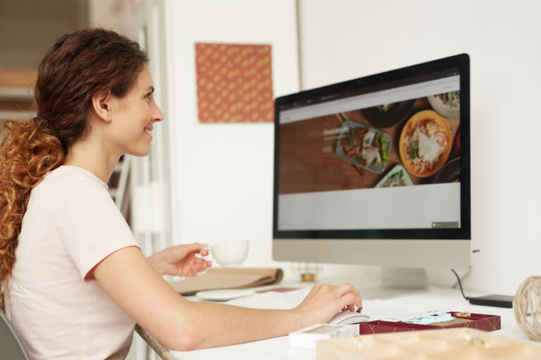 Web designer working on website.