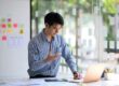 Creative male web designer planning application development for web mobile phone at modern workplace.