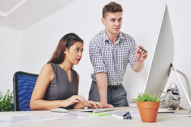 Web developers discussing ADA compliance for web design